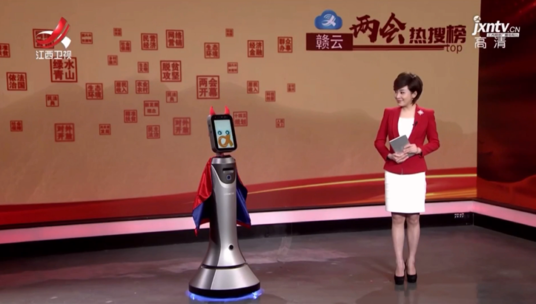受付型ロボット「Baoxiaomi」はニュースアナウンサになり、両会の注目度高いキーワードを完全に解読しました